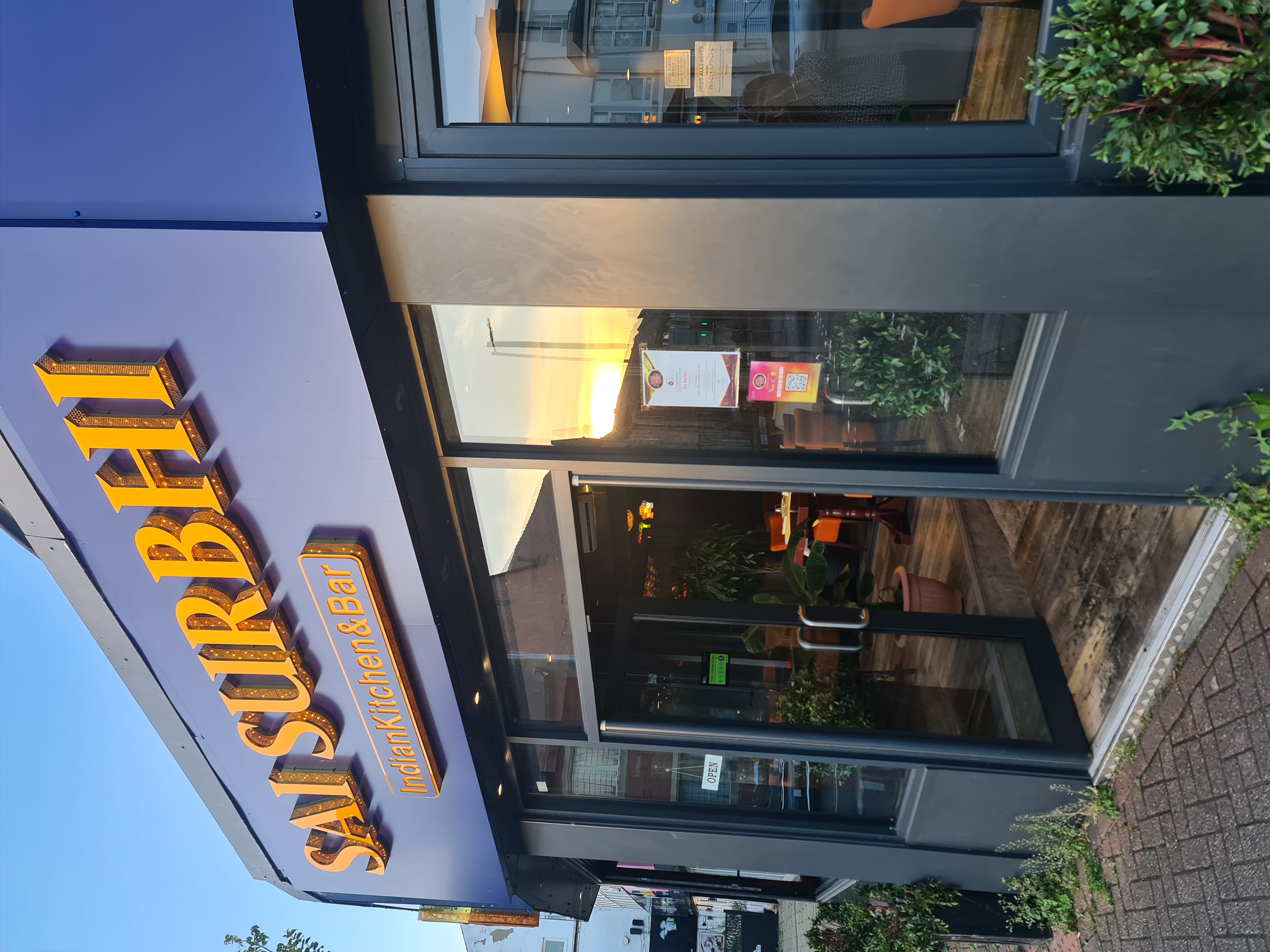 Sai Surbhi Urmston restaurant exterior